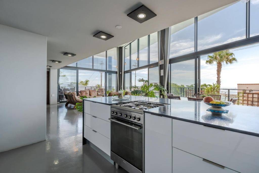 Shared kitchen with ocean views at Villa on Ocean View